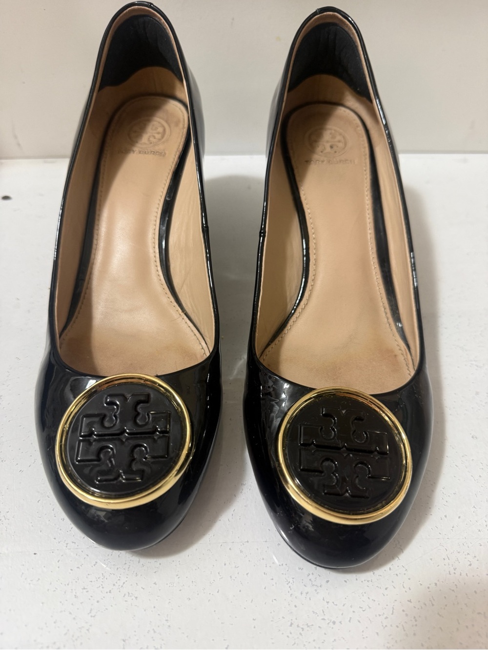 Tory Burch Black Patent Leather Wedges with Gold Logo Medallions